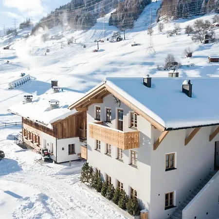 Marmotta Neve - Luxus Ski-in Ski-out Apartament *