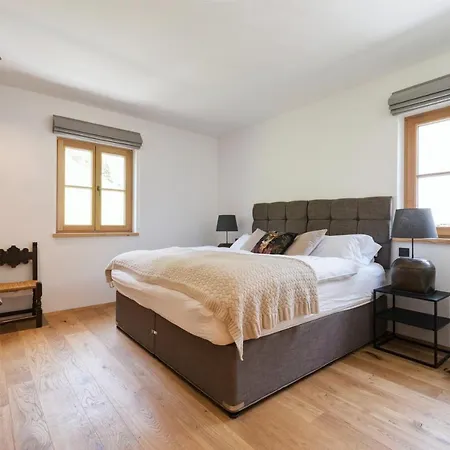 Marmotta Neve - Luxus Ski-in Ski-out Apartament *